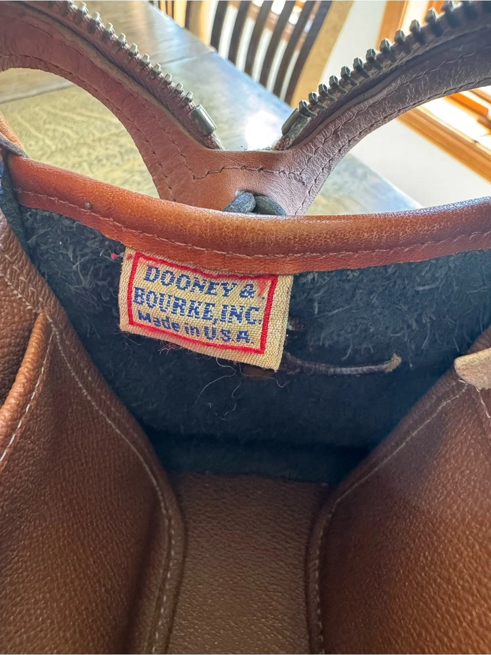 Dooney & Bourke Black and Brown Pebbled Leather Satchel